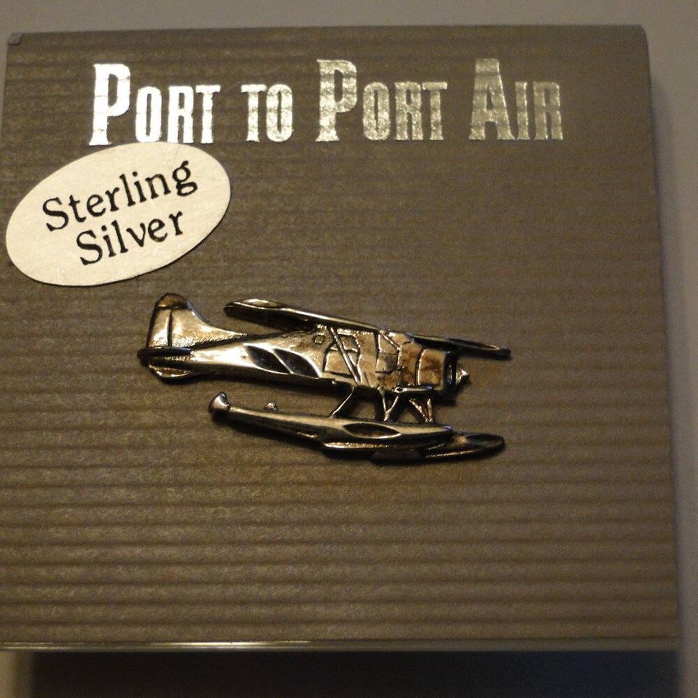 BEAVER ON FLOAT LAPEL PIN